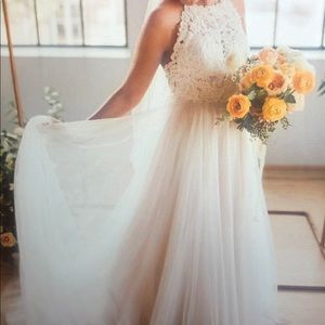 White lace and tulle wedding dress, small train